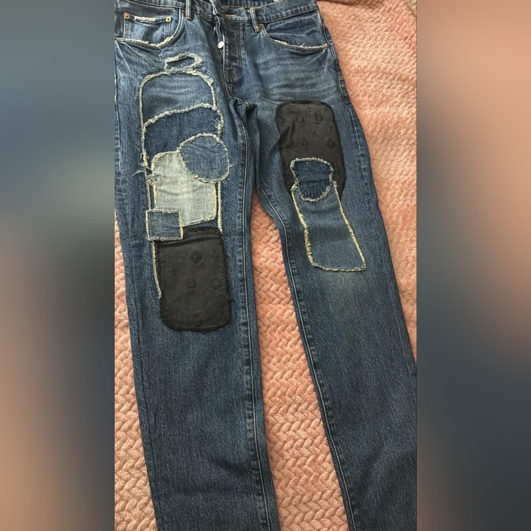 Men's Distressed Blue Jeans With Black Patches